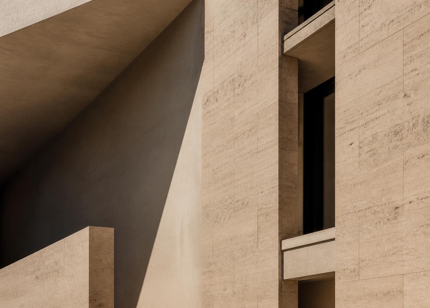 Sunlit stone facade detail
