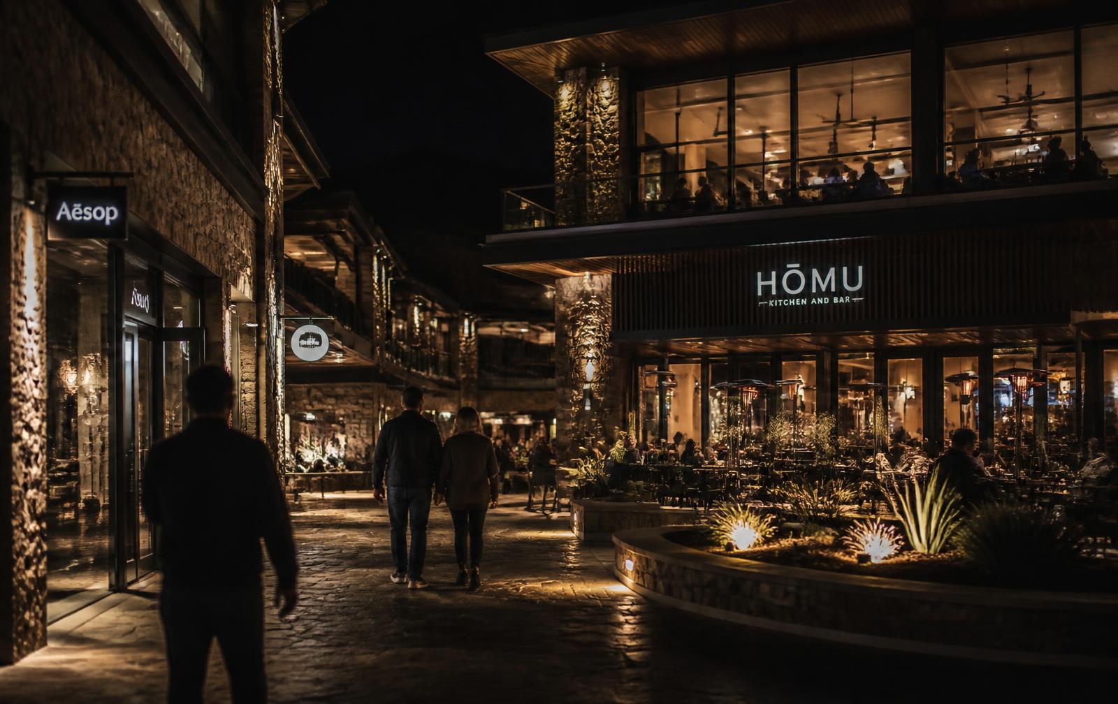 Premium retail and dining destination at night